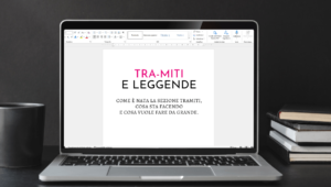 Su uno schermo di portatile aperto, una pagina di word su cui si legge la scritta "Tra trattino miti e leggende", sottotitolo: come è nata la sezione tramiti, cosa sta facendo e cosa vule fare da grande.